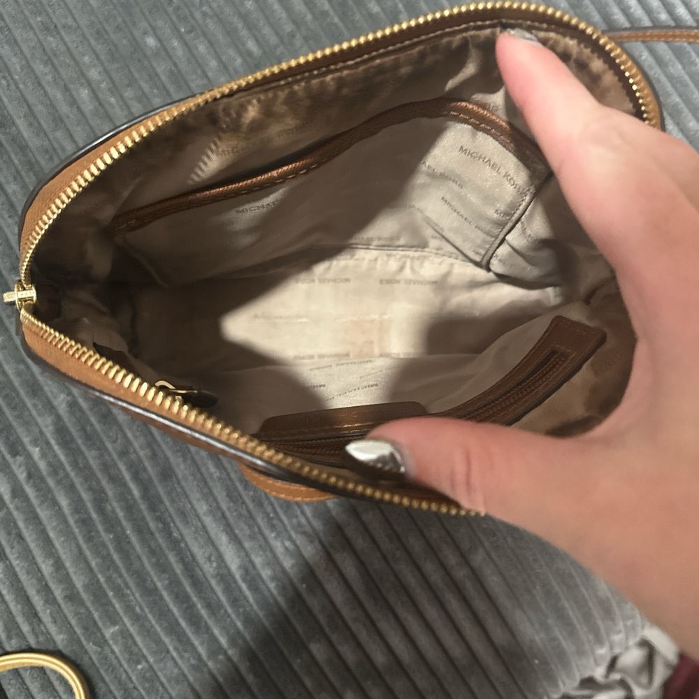 A couple of stain on the inside but the outside is in good condition